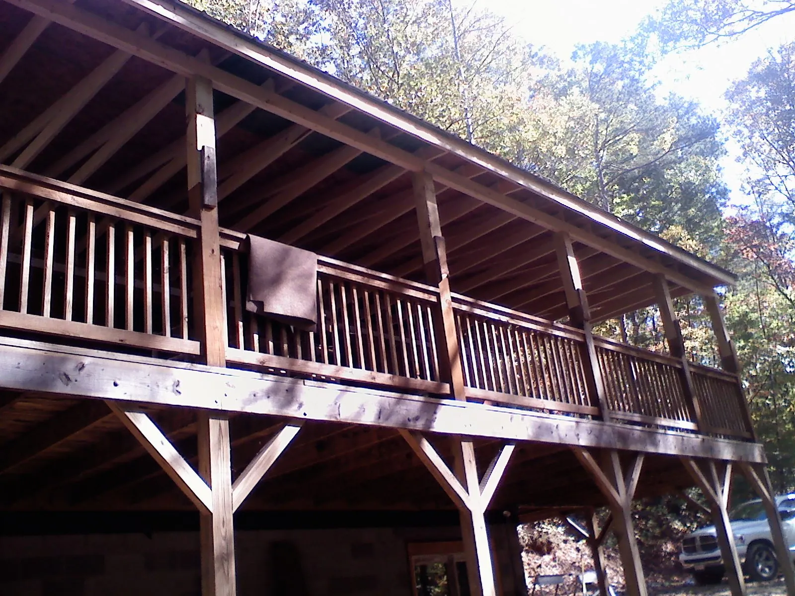 Timber framing under a new elevated porch and deck — Roof Leak Repair in Sudbury by Roofing Brothers
